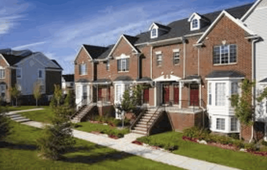 Brick townhomes with attached garages.